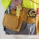 Close-up of construction worker with tool belt